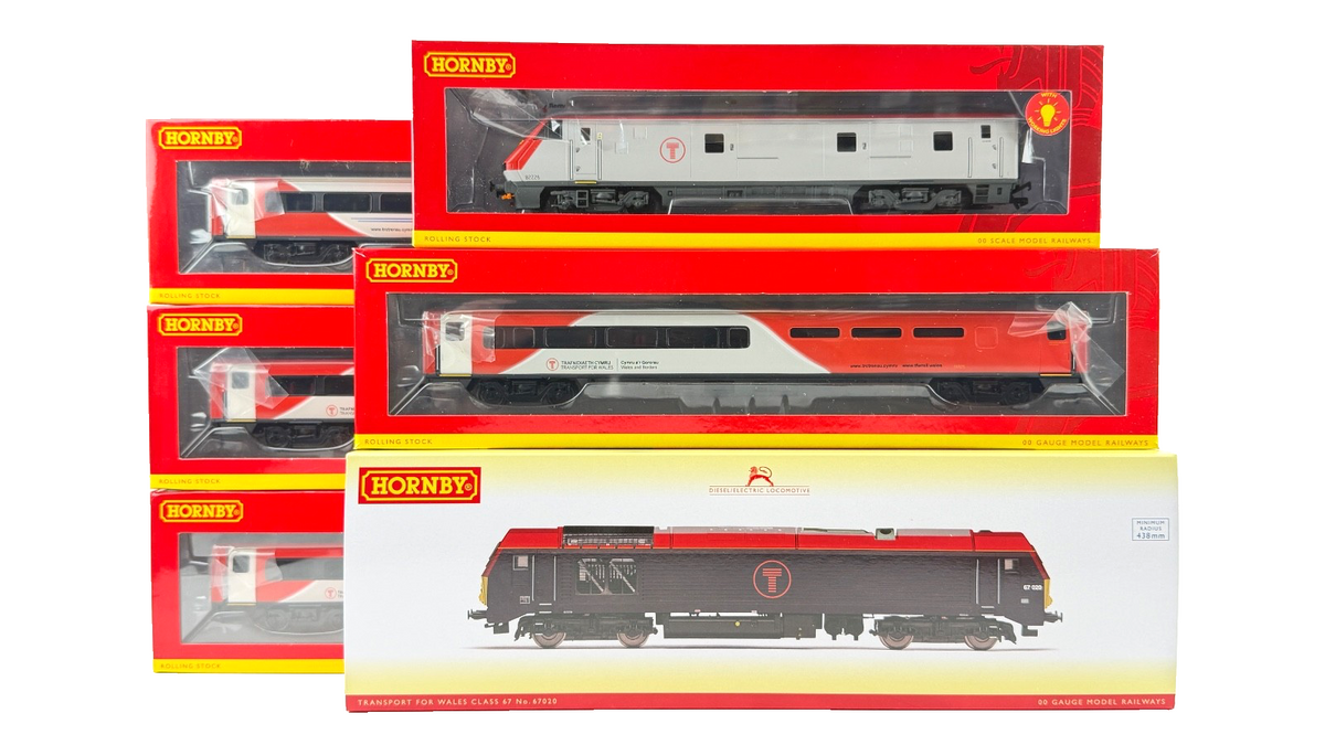 HORNBY OO GAUGE - TRANSPORT FOR WALES CLASS 67 DIESEL, 4 COACHES & DVT BOXED