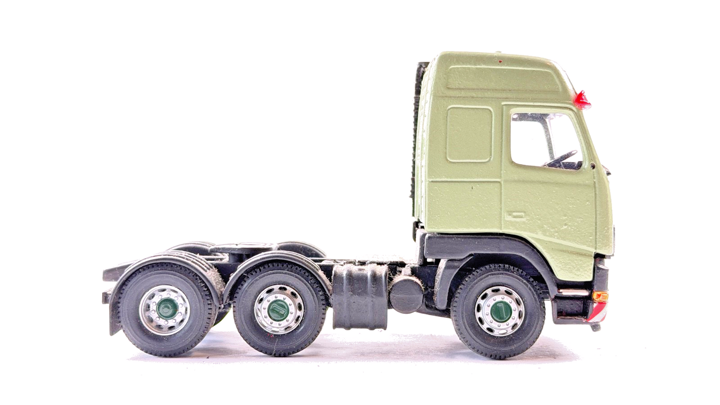 CORGI 1/50 SCALE REPAINTED GREEN VOLVO FH12 6X2 TRACTOR UNIT UNBOXED