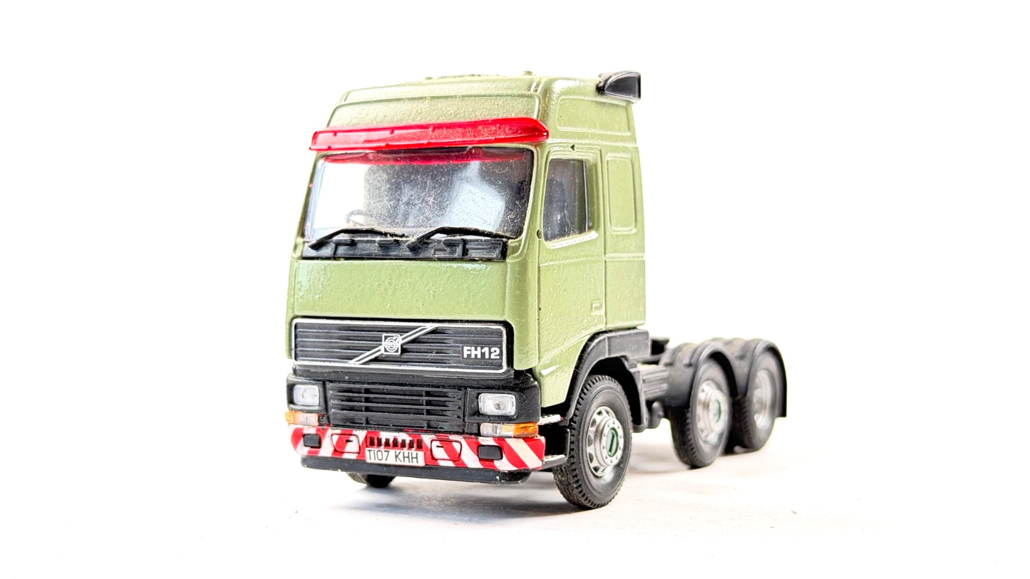 CORGI 1/50 SCALE REPAINTED GREEN VOLVO FH12 6X2 TRACTOR UNIT UNBOXED