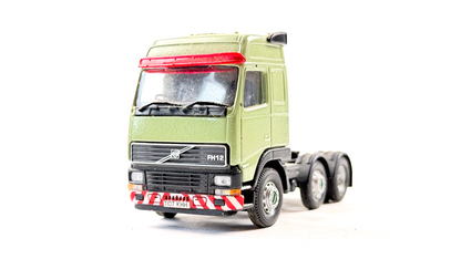 CORGI 1/50 SCALE REPAINTED GREEN VOLVO FH12 6X2 TRACTOR UNIT UNBOXED