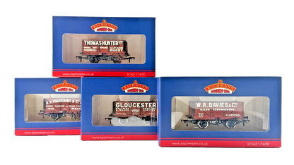 BACHMANN OO GAUGE - MIXED RAKE OF 4 COLLECTORS CLUB PLANK WAGONS BOXED